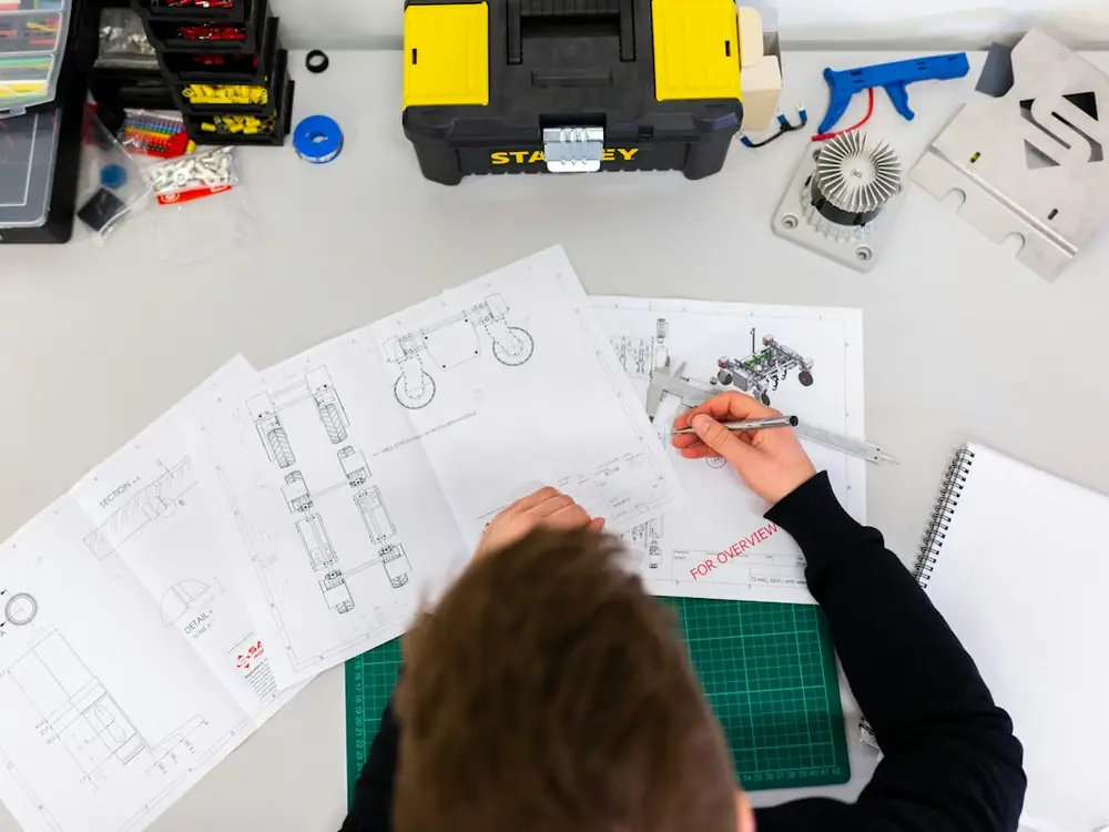 Engineer marking up construction drawings