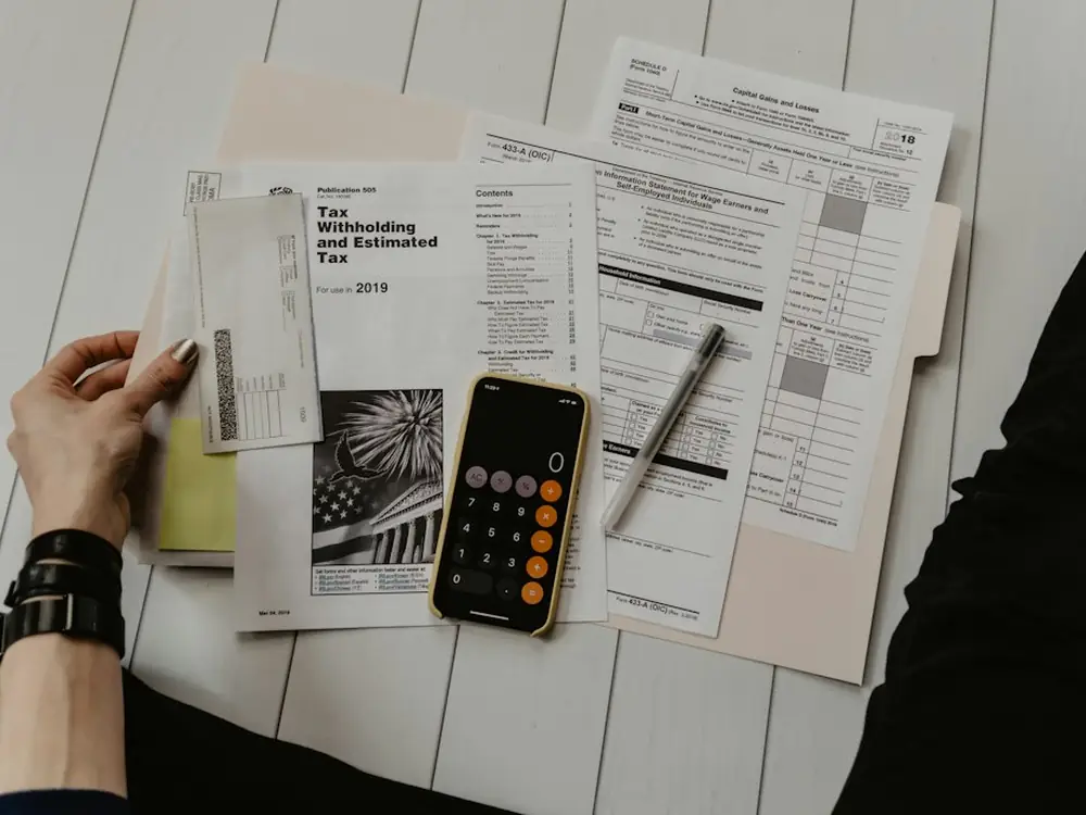 Calculator and estimate sheets on a desk